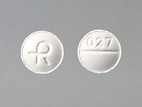 pill 027 round white|white round pill 027 scored.